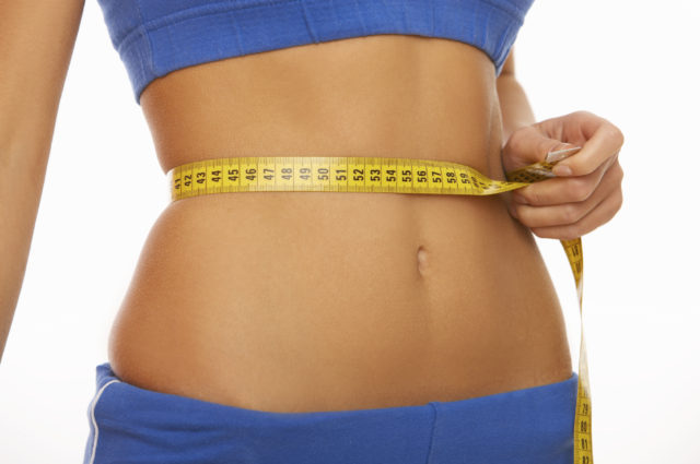 Woman body part is being measured
